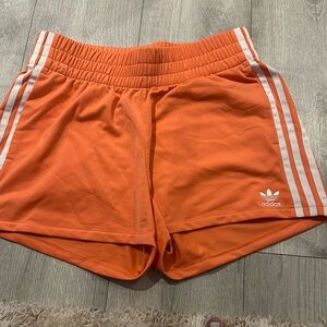 Women’s medium Adidas shorts orange. Comfortable and breathable barely worn